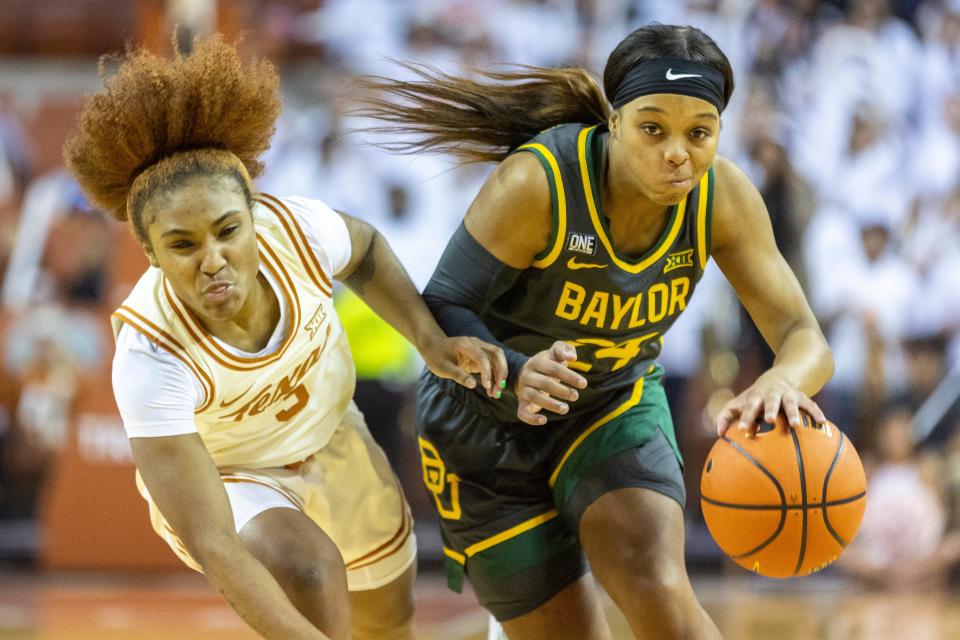 Texas guard Rori Harmon defends as Baylor's Sarah Andrews drives downcourt last season at the Erwin Center. The teams will meet Sunday in Waco at Baylor's Ferrell Center, perhaps the final time they'll play there. Baylor has a new basketball area expected to open for next season.