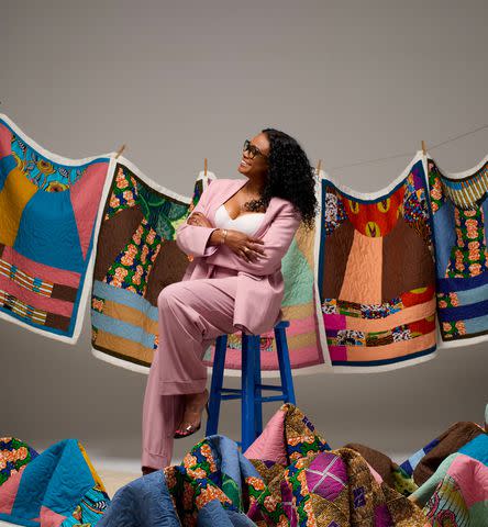 <p>Trokon</p> Tatyana Ali with Baby Yams quilts