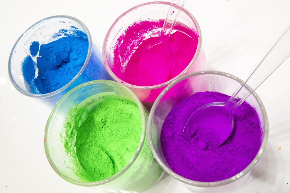 This Oct. 21, 2019, photo shows pigments available in the build a slime bar displayed during a preview of the Sloomoo Institute in New York. An immersive, 8,000-square-foot museum dedicated to all things slime opens Friday for a nearly six-month celebration before hitting the road to other locales. (AP Photo/Mary Altaffer)