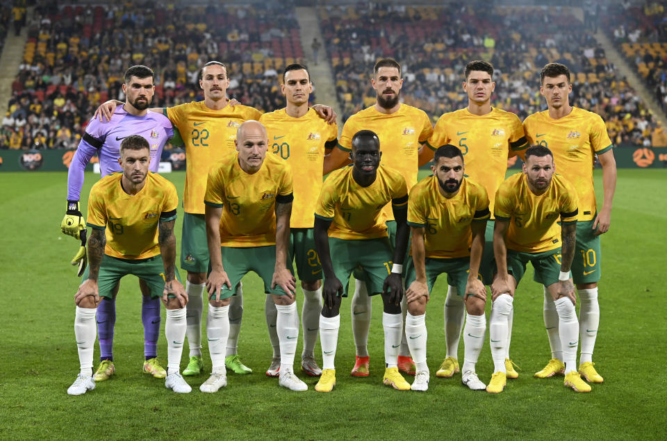 FILE - The Australian national soccer team, the Socceroos, pose for a photo before the start of a friendly soccer international against New Zealand in Brisbane, Australia, Thursday, Sept. 22, 2022. Socceroos' Head Coach Graham Arnold has named his 26-man squad, Tuesday, Nov. 8, 2022, to represent Australia, at the FIFA World Cup Qatar 2022. (AP Photo/Dan Peled, File)