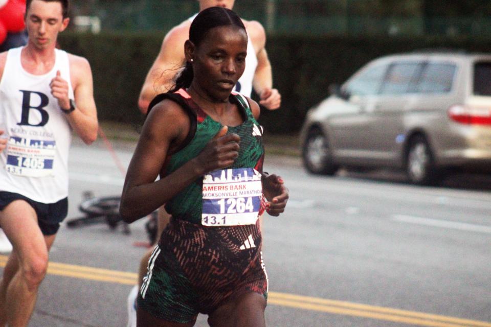 Atsede Tesema runs during the women's half marathon at the Ameris Bank Jacksonville Marathon on December 10, 2023. [Clayton Freeman/Florida Times-Union]