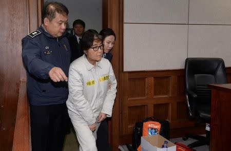 Choi Soon-sil, a long-time friend of South Korean President Park Geun-hye who is at the center of the South Korean political scandal involving Park, arrives for her first court hearing in Seoul, South Korea, December 19, 2016. Korea Pool/via REUTERS