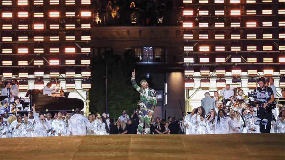 Fashion designer and musician Pharrell Williams walks the runway during the Louis Vuitton menswear show on Paris’s historic Pont Neuf last June