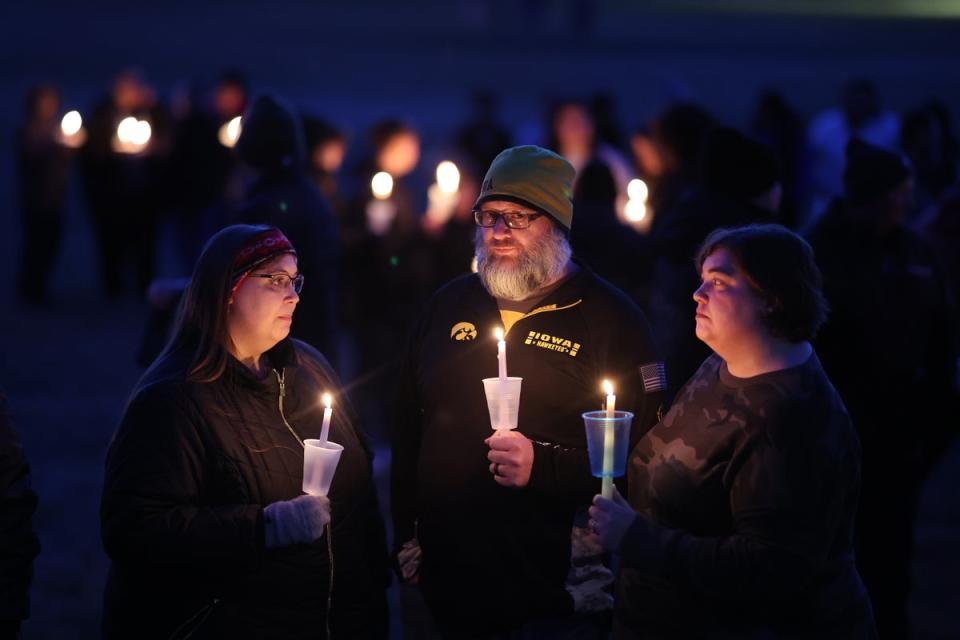 Community members gather in Wiese Park for a candlelight vigil (Getty Images)