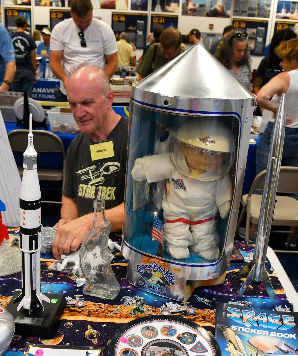 Alan Schmidt, an Ormond Beach vendor, offers a 1986 Cabbage Patch Kids Young Astronaut doll for $100 during Saturday's Space Collectibles Show and Sale.