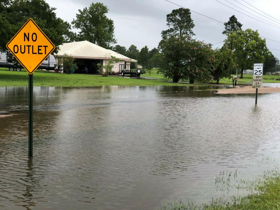 Floodwater pools near homes in St. Martinville, La., Sunday, July 14, 2019, in the aftermath of Tropical Storm Barry. (Carrie Cuchens via AP)