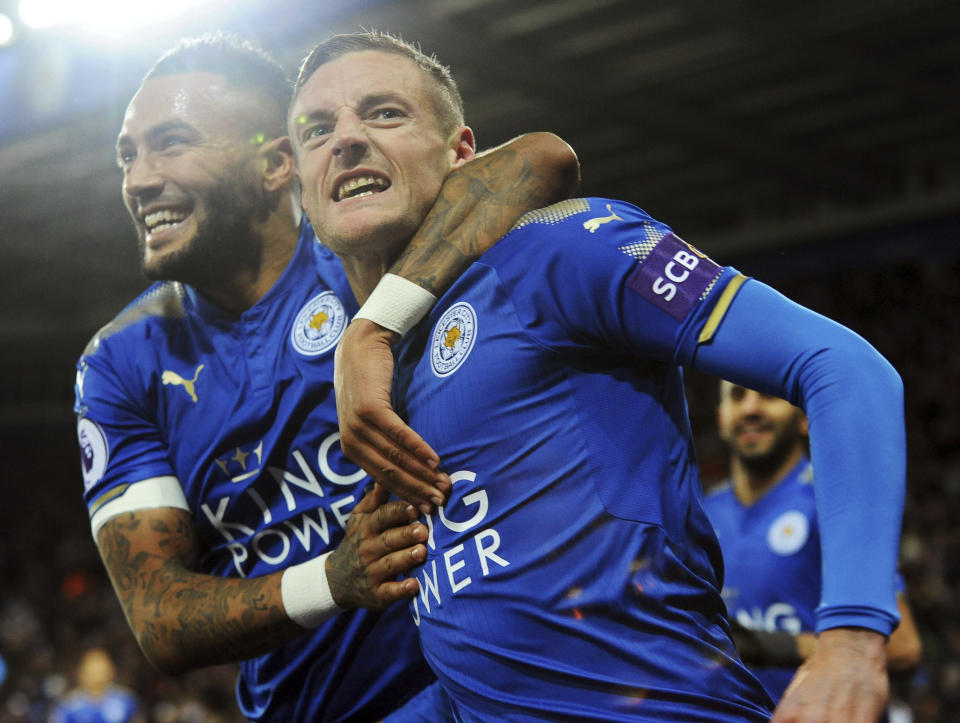 Leicester’s Jamie Vardy, right, celebrates with Leicester’s Danny Simpson after scoring during the English Premier League soccer match between Leicester City and Tottenham Hotspur at the King Power Stadium in Leicester, England, Tuesday, Nov. 28, 2017. (AP Photo/Rui Vieira)