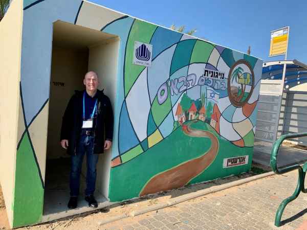 Durham Town Administrator Todd Selig stands in a bomb shelter during a trip to a village along the Israel border in late 2019.