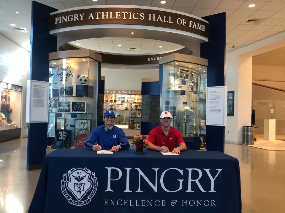 Pingry's Luke Engelke (left) and Ryan Palmer sign their National Letters of Intent on Wednesday, Nov, 10, 2021.