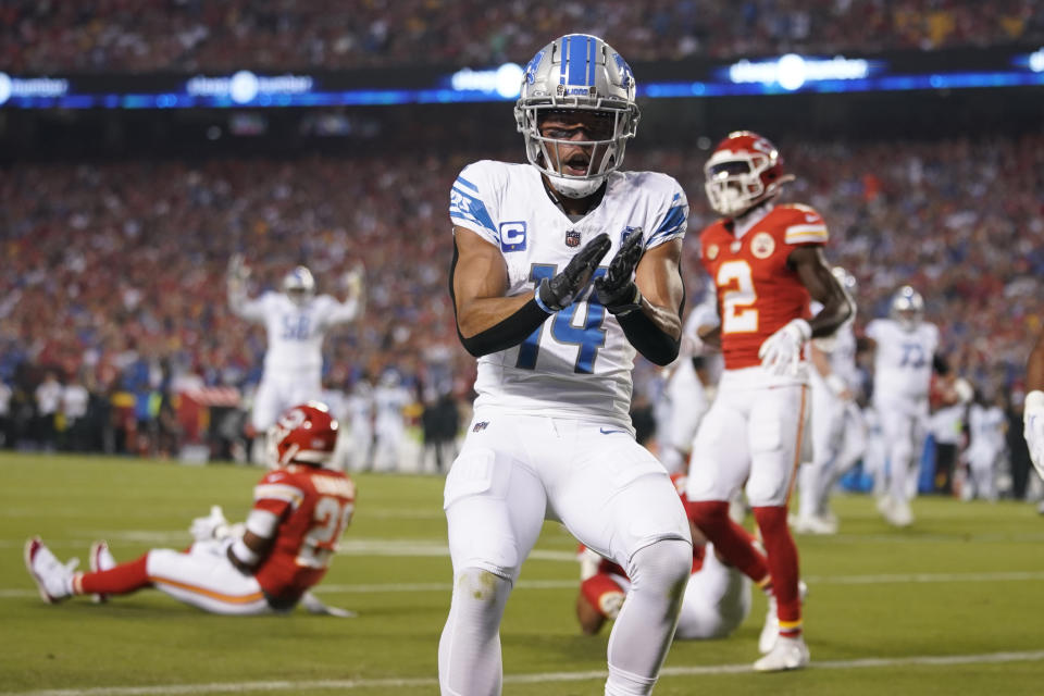 Detroit Lions wide receiver Amon-Ra St. Brown celebrates after scoring during the first half of an NFL football game against the Kansas City Chiefs Thursday, Sept. 7, 2023, in Kansas City, Mo. (AP Photo/Ed Zurga)