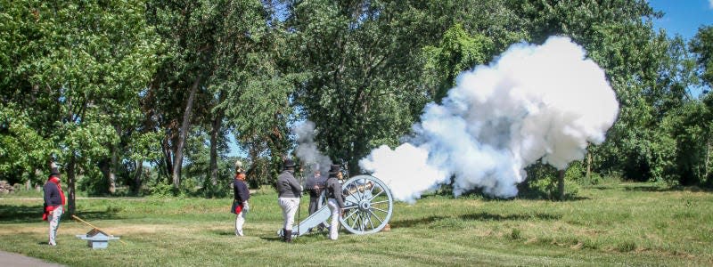 Black powder firing demonstrations will be among the activities at Saturday's Living History Encampment and Demonstrations at the River Raisin National Battlefield Park. In this 2018 photo, John Destatte from Perrysburg, Ohio, and members of the 2nd U.S. Artillery Lanwell Detachment demonstrate how a 1760 Howitzer cannon shoots exploding shells at the battlefield.