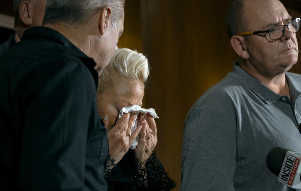 Charlotte Charles, mother of Harry Dunn, who died after his motorbike was involved in an August 2019 accident in Britain with Anne Sacoolas, wife of an American diplomat, wipes her eyes at a news conference as she is joined by family members and supporters Monday, Oct. 14, 2019, in New York. The family is seeking answers after Sacoolas returned to the United States after being granted diplomatic immunity following the crash. (AP Photo/Craig Ruttle)