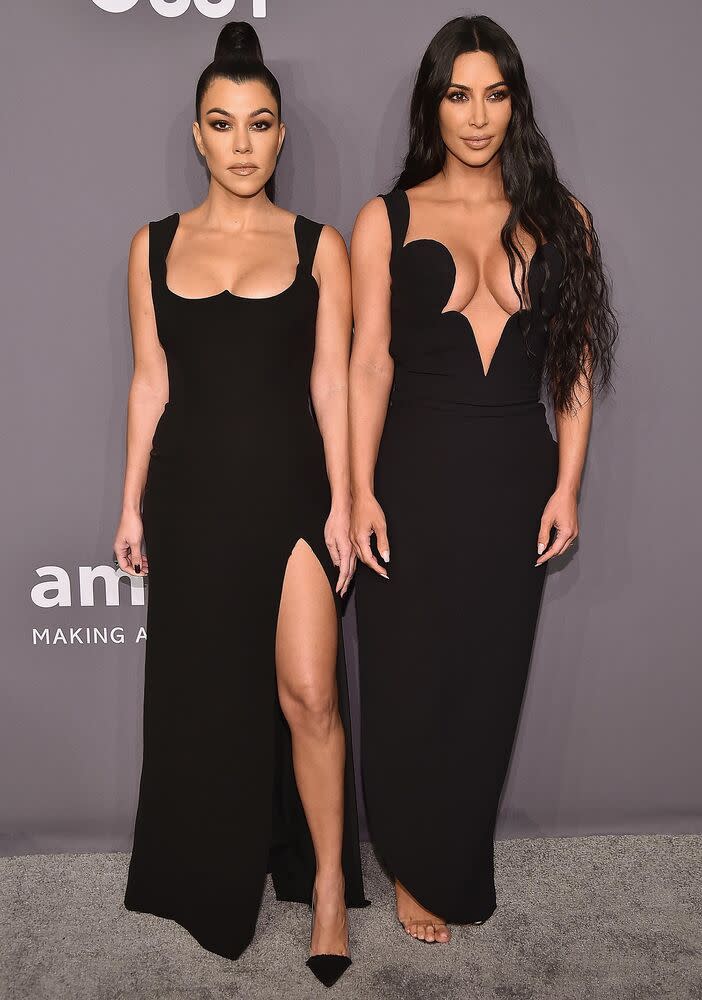 Kourtney (left) and Kim Kardashian  | Theo Wargo/Getty