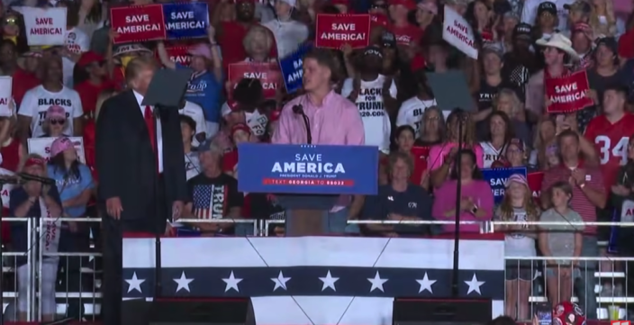 Lance Cpl Hunter Clark onstage with Donald Trump in Georgia.  (11 Alive/YouTUbe)