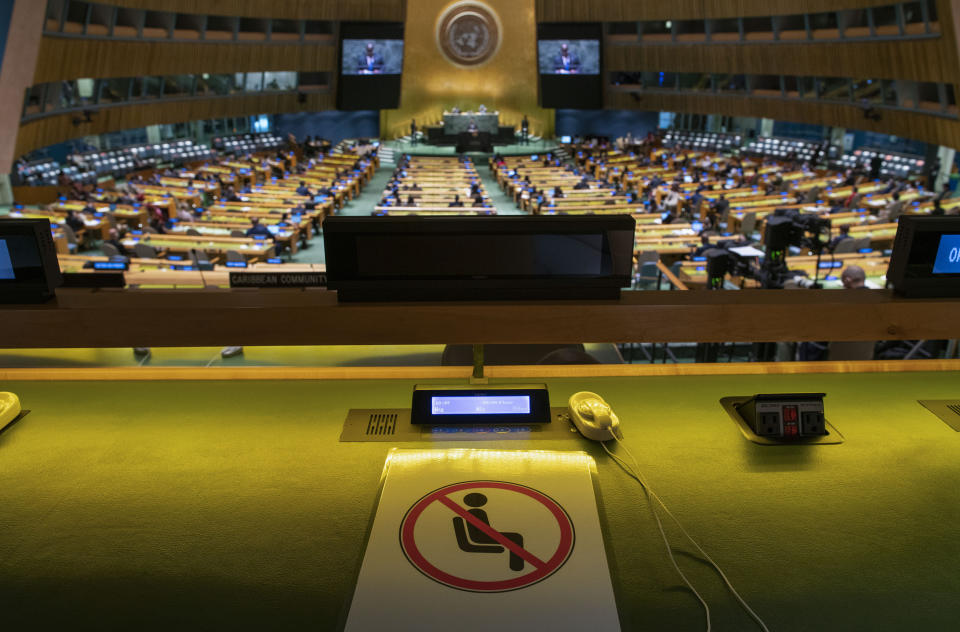 A seat is marked off for social distancing because of the coronavirus disease (COVID-19) pandemic as Democratic Republic of Congo President Felix Tshisekedi addresses the 76th Session of the U.N. General Assembly Tuesday, Sept. 21, 2021. (Eduardo Munoz/Pool Photo via AP)