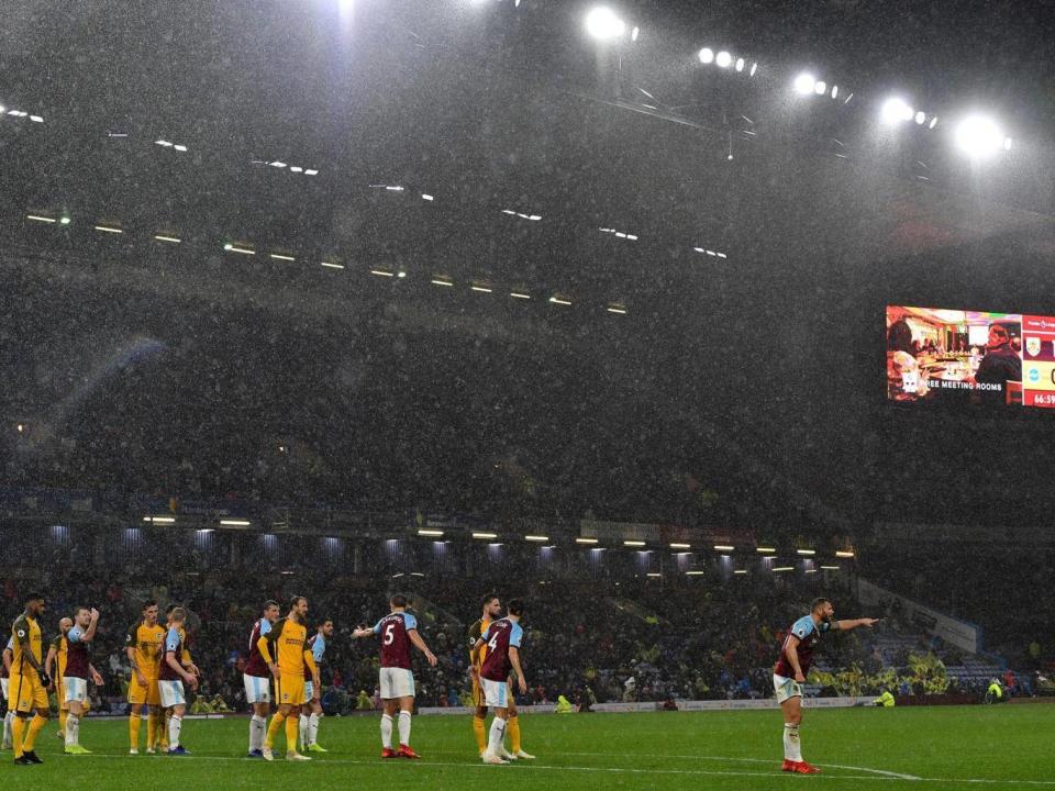 The game was played in torrential rain (PA)