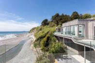 <p>Seaton House is an award-winning, eco-friendly waterside home featuring a beach on its doorstep to provide stunning panoramic sea views. The property has four bedrooms, three bathrooms, and a terrace that wraps around the house with a heated outdoor pool, hot tub, pool house and <a href="https://www.housebeautiful.com/uk/garden/g32185721/fire-pit/" rel="nofollow noopener" target="_blank" data-ylk="slk:fire pit;elm:context_link;itc:0;sec:content-canvas" class="link ">fire pit</a>. It also features steps leading directly down to the beach, perfect if you fancy a quick dip in the sea or an idyllic stroll along the shoreline.</p><p><a class="link " href="https://www.rightmove.co.uk/properties/94159754#/" rel="nofollow noopener" target="_blank" data-ylk="slk:TOUR NOW;elm:context_link;itc:0;sec:content-canvas">TOUR NOW</a></p>