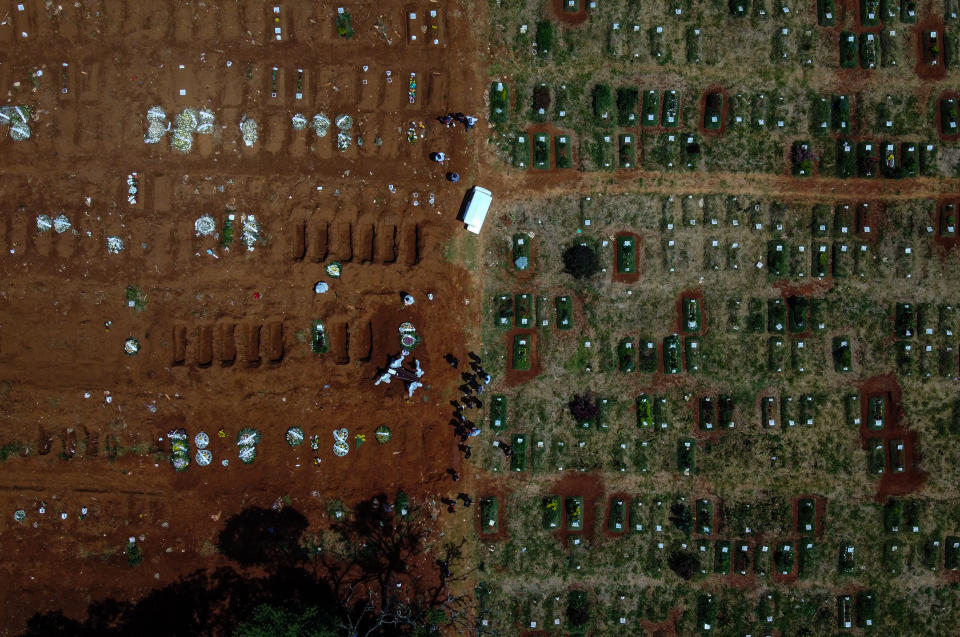 An aerial view of open graves at Vila Formosa Cemetery on March 12, 2021 in Sao Paulo, Brazil. Source: Getty