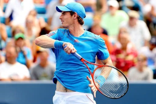 Andy Murray of Great Britain returns a shot to Jeremy Chardy of France during the Western & Southern Open at the Lindner Family Tennis Center. Murray was sent crashing out of the Cincinnati Masters on Thursday, going down to a shock 6-4, 6-4 defeat at the hands of Chardy