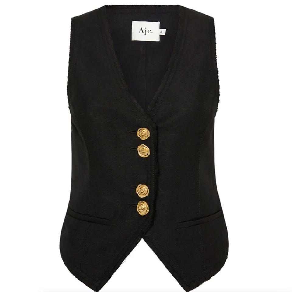 <p><a href="https://go.redirectingat.com?id=74968X1596630&url=https%3A%2F%2Fajeworld.com%2Fproducts%2Fprimrose-tailored-vest-black&sref=https%3A%2F%2Fwww.harpersbazaar.com%2Ffashion%2Ftrends%2Fg40573904%2Fsuit-vest-for-women%2F" rel="nofollow noopener" target="_blank" data-ylk="slk:Shop Now;elm:context_link;itc:0;sec:content-canvas" class="link ">Shop Now</a></p><p>Primrose Tailored Vest</p><p>$325.00</p><p>ajeworld.com</p><span class="copyright">Aje</span>