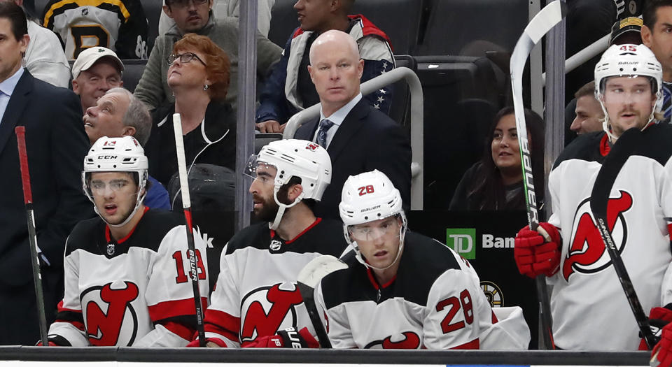 BOSTON, MA - OCTOBER 12: New Jersey Devils head coach John Hynes watches from the bench during a game between the Boston Bruins and the New Jersey Devils on October 12, 2019, at TD Garden in Boston, Massachusetts. (Photo by Fred Kfoury III/Icon Sportswire via Getty Images)