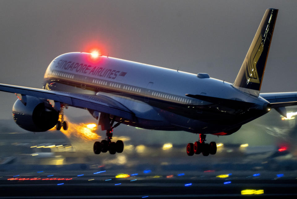 A SIA aircraft lands in Frankfurt, illustrating a story on SIA and Scoot carrying 3 million passengers in July 2023.