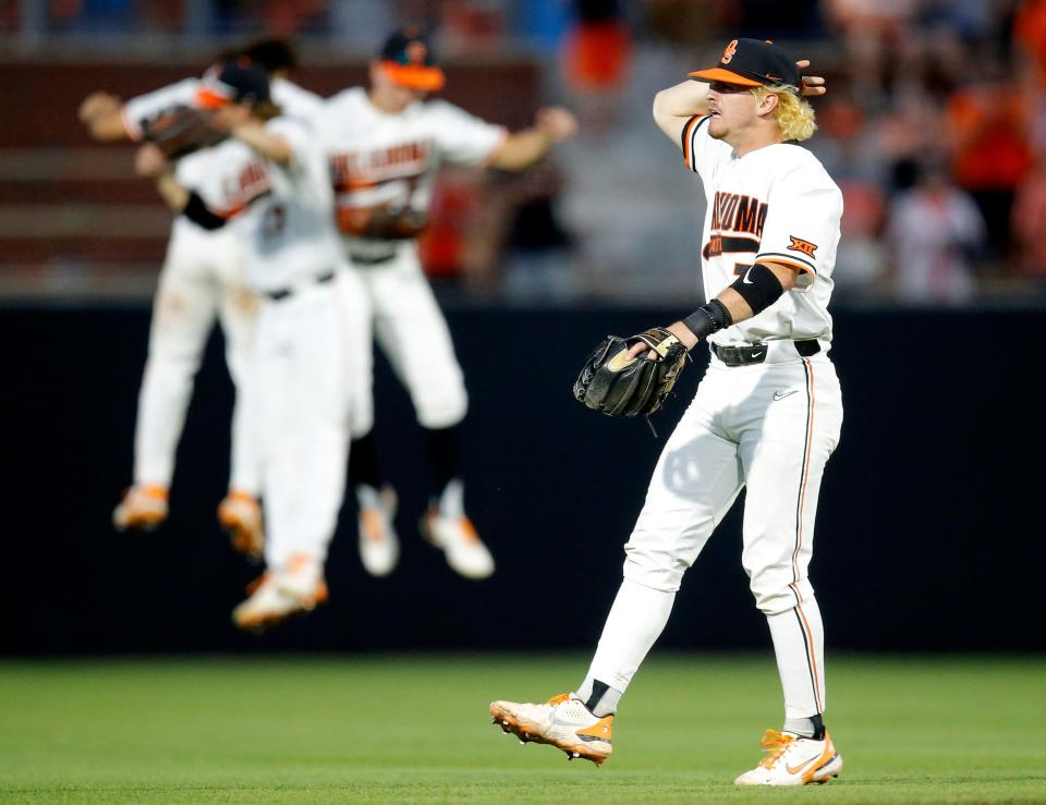 Oklahoma State's Roc Riggio (7) celebrates following the NCAA Stillwater Regional baseball game between Oklahoma State Cowboys and Missouri State Bears at the O'Brate Stadium in Stillwater, Okla., Friday, June, 3, 2022. 