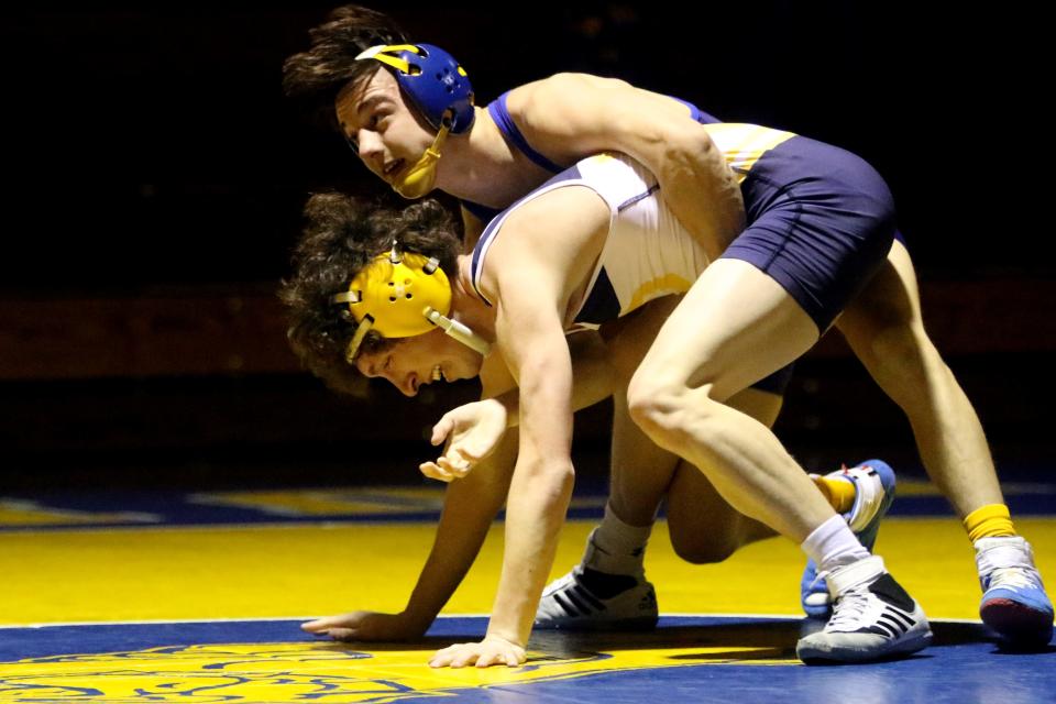 Brett Redner (top), of Butler, gets takes on Jay Bode, of Pequannock.  Thursday, March 18, 2021