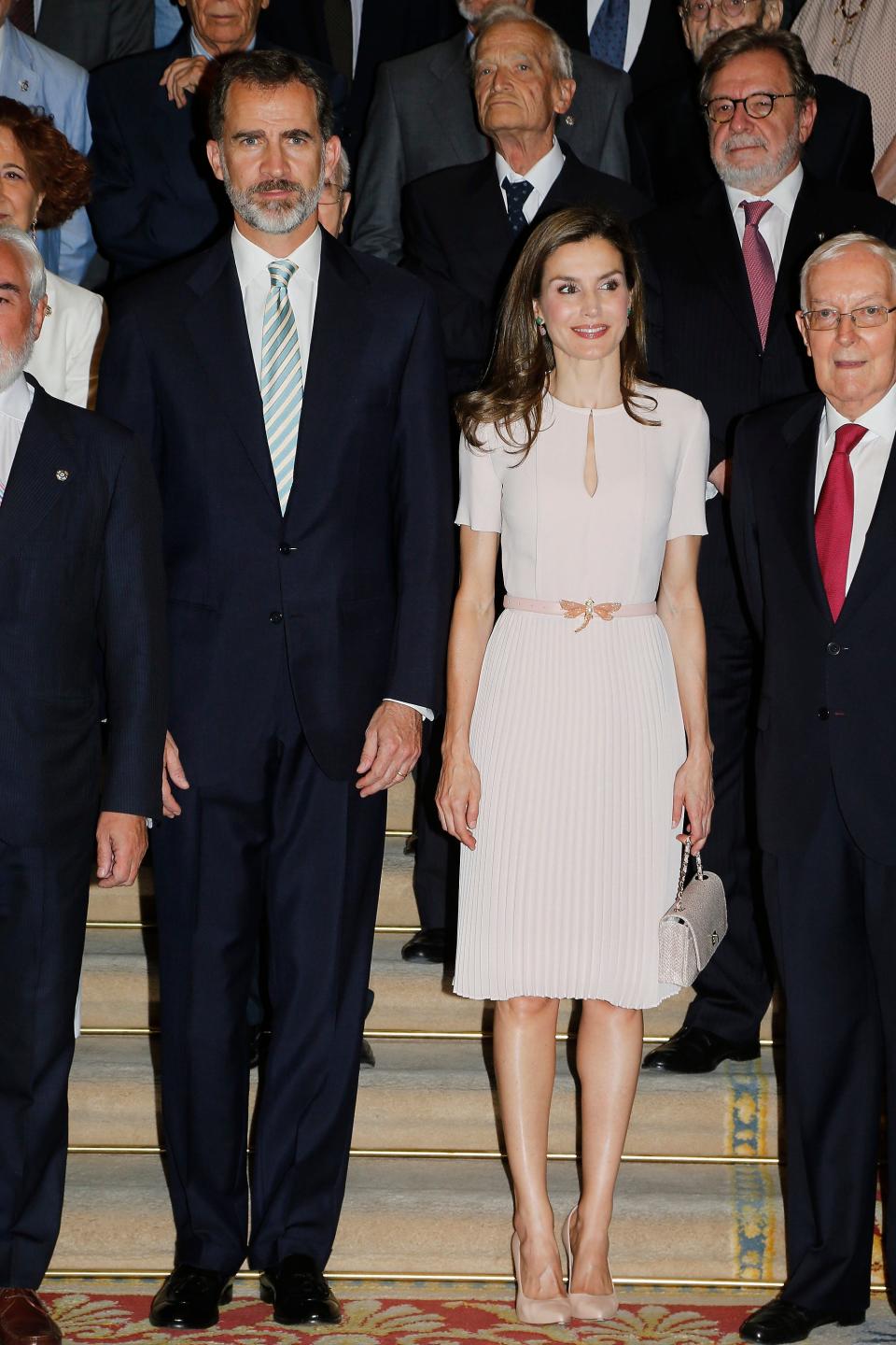 Queen Letizia of Spain wearing a pink dress