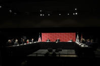 Vice President Mike Pence, center, participates in a roundtable discussion Wednesday, May 20, 2020, in Orlando, Fla. The roundtable was held with hospitality and tourism industry leaders to discuss their plans for re-opening during the coronavirus outbreak. (AP Photo/Chris O'Meara)