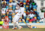 West Indies cricketer Kirk Edwards takes a run during the first day of the first-of-three Test matches between Australia and West Indies at the Kensington Oval stadium in Bridgetown on April 7, 2012. West Indies have scored 60/1 at lunch. AFP PHOTO/Jewel Samad (Photo credit should read JEWEL SAMAD/AFP/Getty Images)