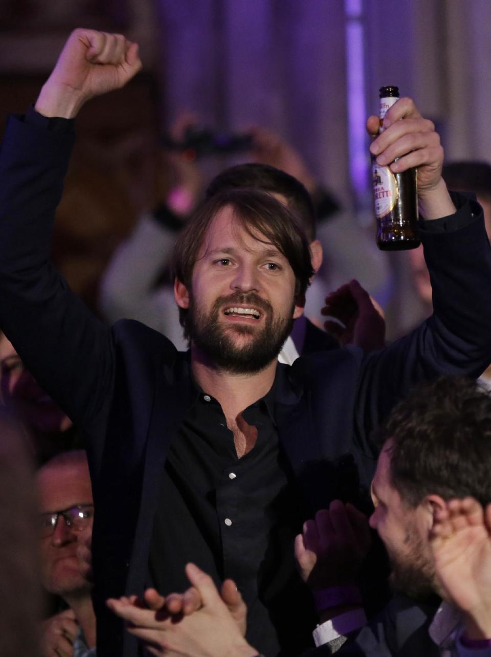 Danish chef Rene Redzepi celebrates after his restaurant Noma in Copenhagen, Denmark won the second place during the World's 50 Best Restaurant Awards in London, Monday, April 29, 2013. (AP Photo/Lefteris Pitarakis)