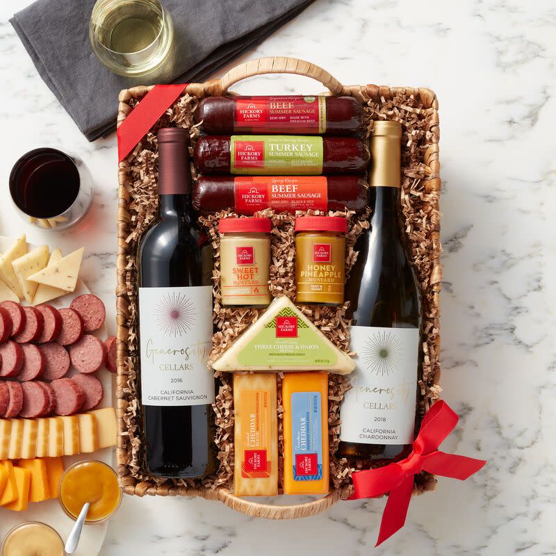 <p><a href="https://go.redirectingat.com?id=74968X1596630&url=https%3A%2F%2Fwww.hickoryfarms.com%2Fgift-baskets%2Fwine%2Fhearty-bites-and-wine-gift-basket-002627.html&sref=https%3A%2F%2Fwww.esquire.com%2Flifestyle%2Fg29418091%2Fgift-baskets-for-men%2F" rel="nofollow noopener" target="_blank" data-ylk="slk:Shop Now;elm:context_link;itc:0;sec:content-canvas" class="link rapid-noclick-resp">Shop Now</a></p><p>Hearty Bites & Wine Gift Basket</p><p>hickoryfarms.com</p><p>$99.99</p>