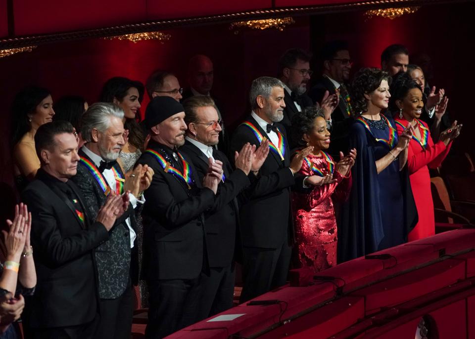 The 45th Kennedy Center Honors will air at 8 p.m. (EST/PST) Dec. 28 on CBS and Paramount +. Pictured: Honorees U2 members (Larry Mullen Jr., Adam Clayton, The Edge, and Bono), George Clooney, Tania León, Amy Grant, and Gladys Knight.