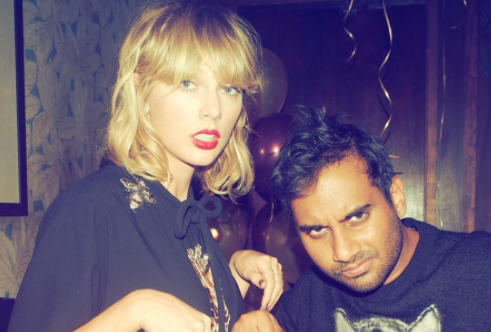 Taylor Swift and Aziz Ansari pose with matching cat shirts and it’s what we needed today