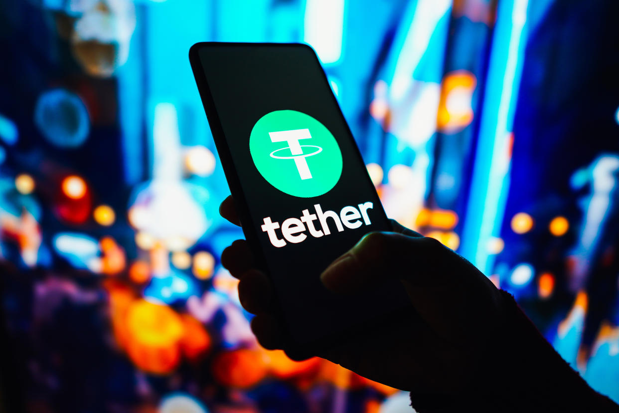 BRAZIL - 2022/09/20: In this photo illustration, the Tether logo seen displayed on a smartphone. (Photo Illustration by Rafael Henrique/SOPA Images/LightRocket via Getty Images)