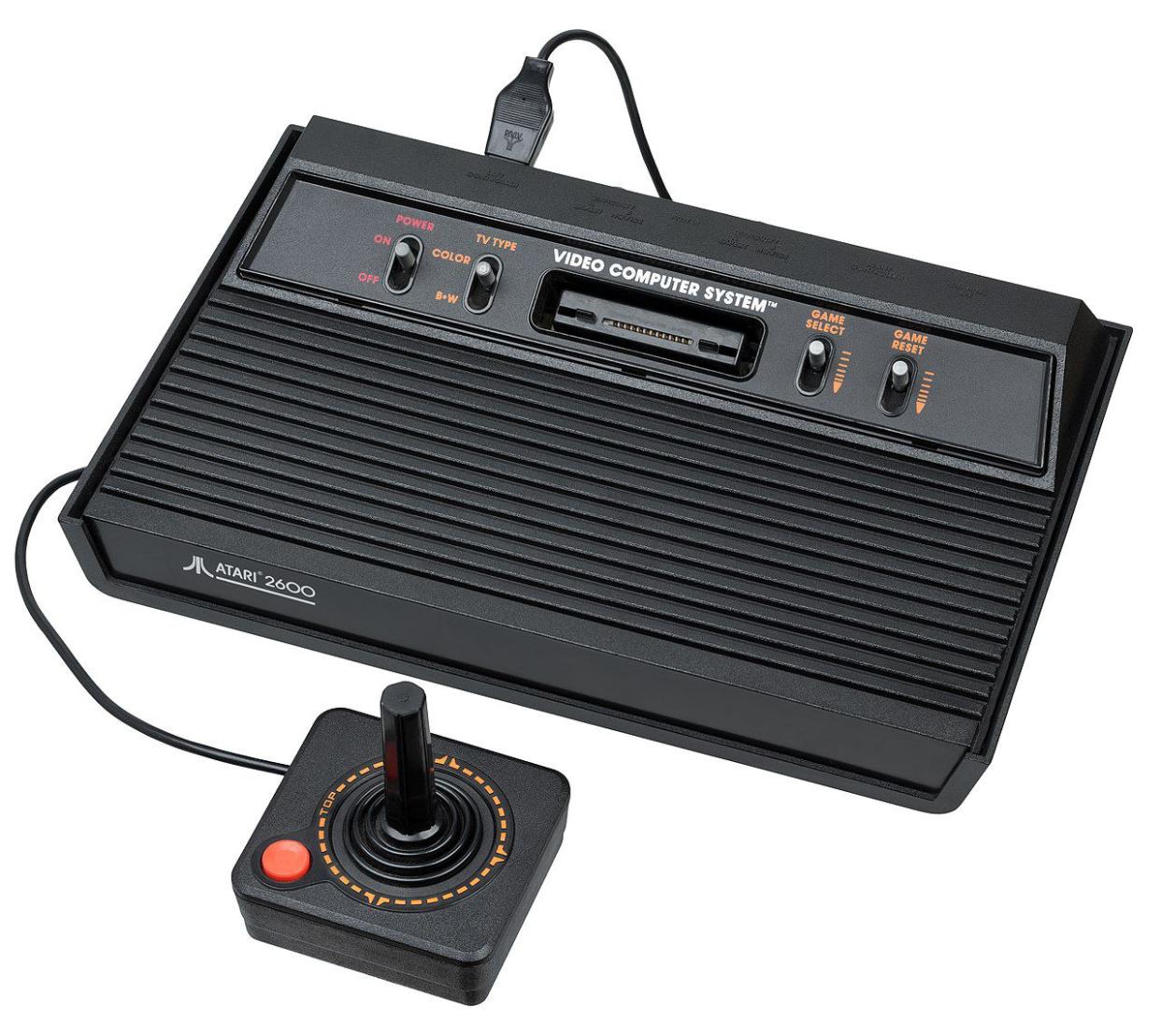 An Atari 2600 video game console, shown in all black. Also known as the "Darth Vader" version that came after the wood veneer version.