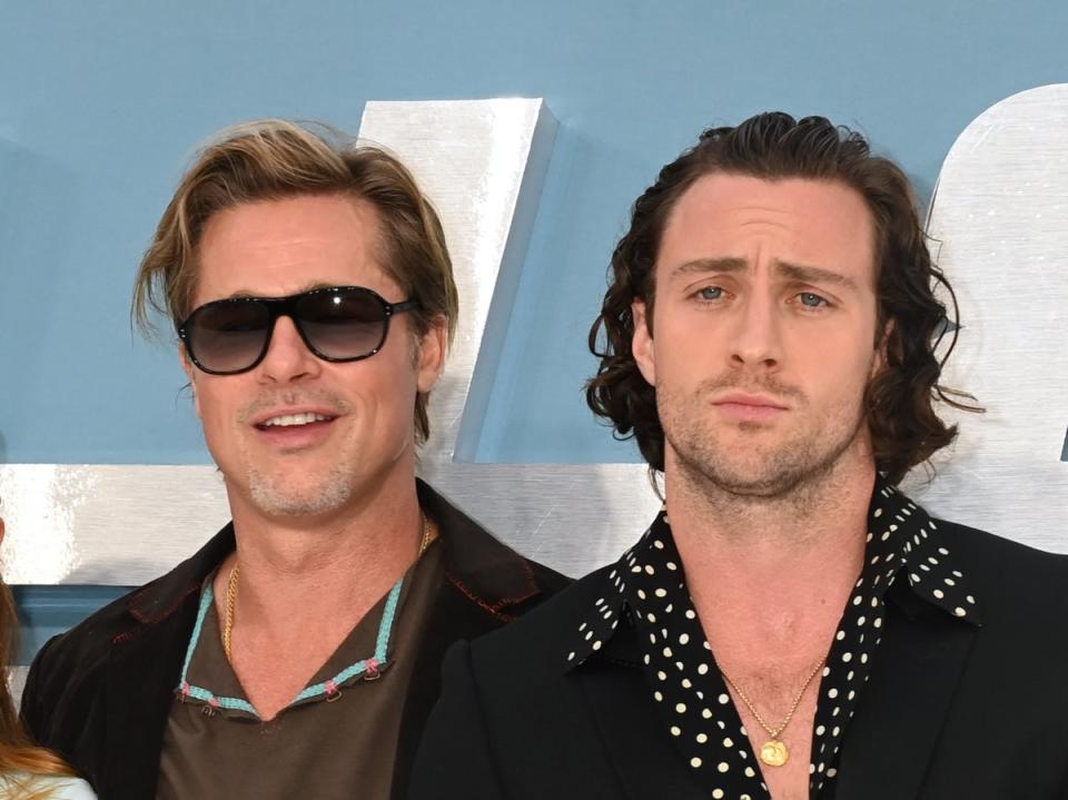 Brad Pitt (izquierda) y Aaron Taylor-Johnson (Dave J Hogan/Getty Images)