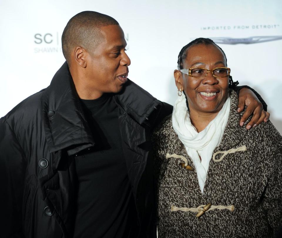 Rapper Jay-Z poses with his mother, Gloria Carter, at an event hosted by the Shawn Carter Foundation in 2011 in New York City. <a href="https://www.gettyimages.com/detail/news-photo/jay-z-poses-with-his-mother-gloria-carter-during-an-evening-news-photo/127579081?adppopup=true" rel="nofollow noopener" target="_blank" data-ylk="slk:Jamie McCarthy via Getty Images;elm:context_link;itc:0;sec:content-canvas" class="link ">Jamie McCarthy via Getty Images</a>