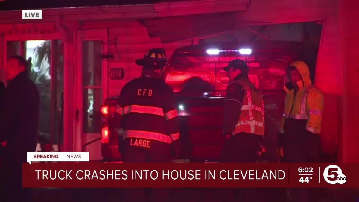 Truck crashes into house in Cleveland