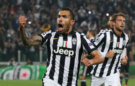 Juventus v Real Madrid - UEFA Champions League Semi Final First Leg - Juventus Stadium, Turin, Italy - 5/5/15 Juventus' Carlos Tevez celebrates scoring their second goal from the penalty spot Reuters / Stefano Rellandini