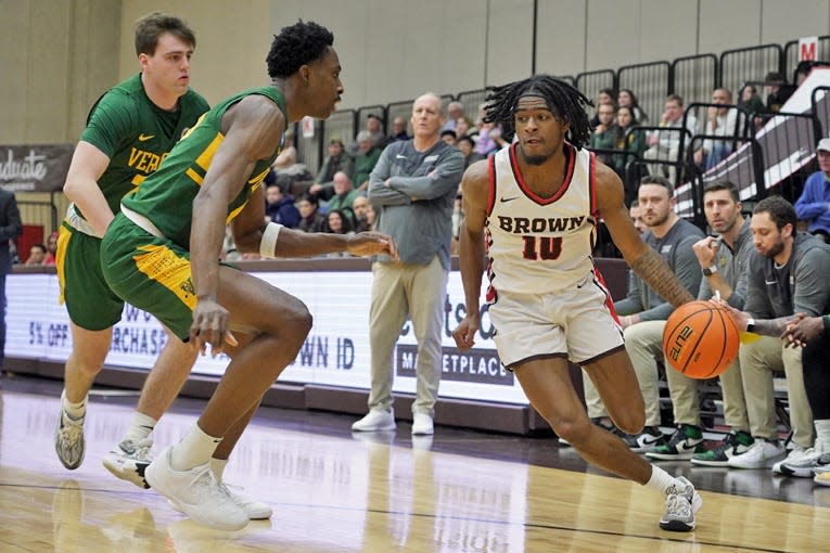 Kino Lilly Jr., right, will be back to lead the Brown Bears this season.