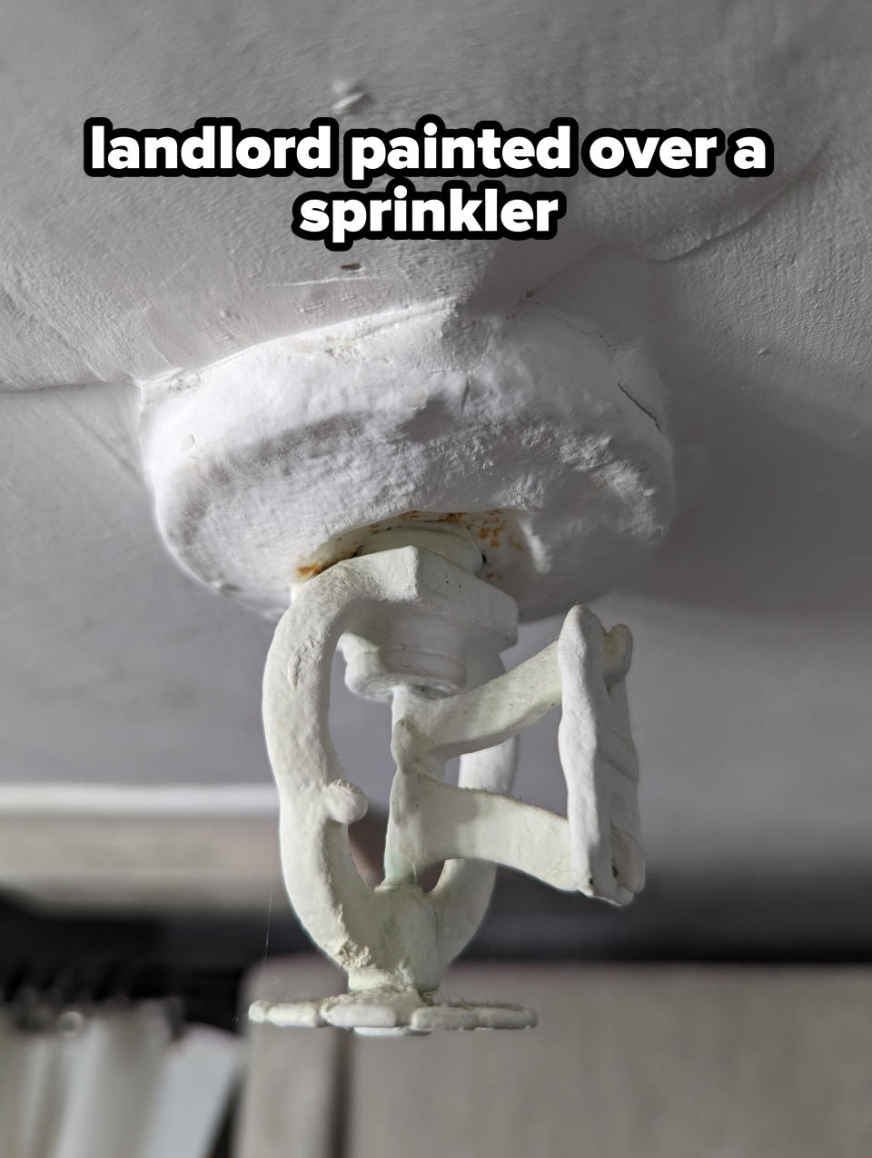 sprinkler that has been painted over