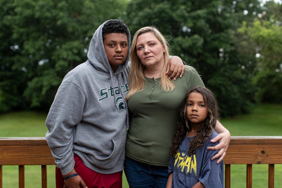 Kristine Courts with her son Darian Courts, 15, and daughter Devyn Courts, 9, on July 8, 2022.