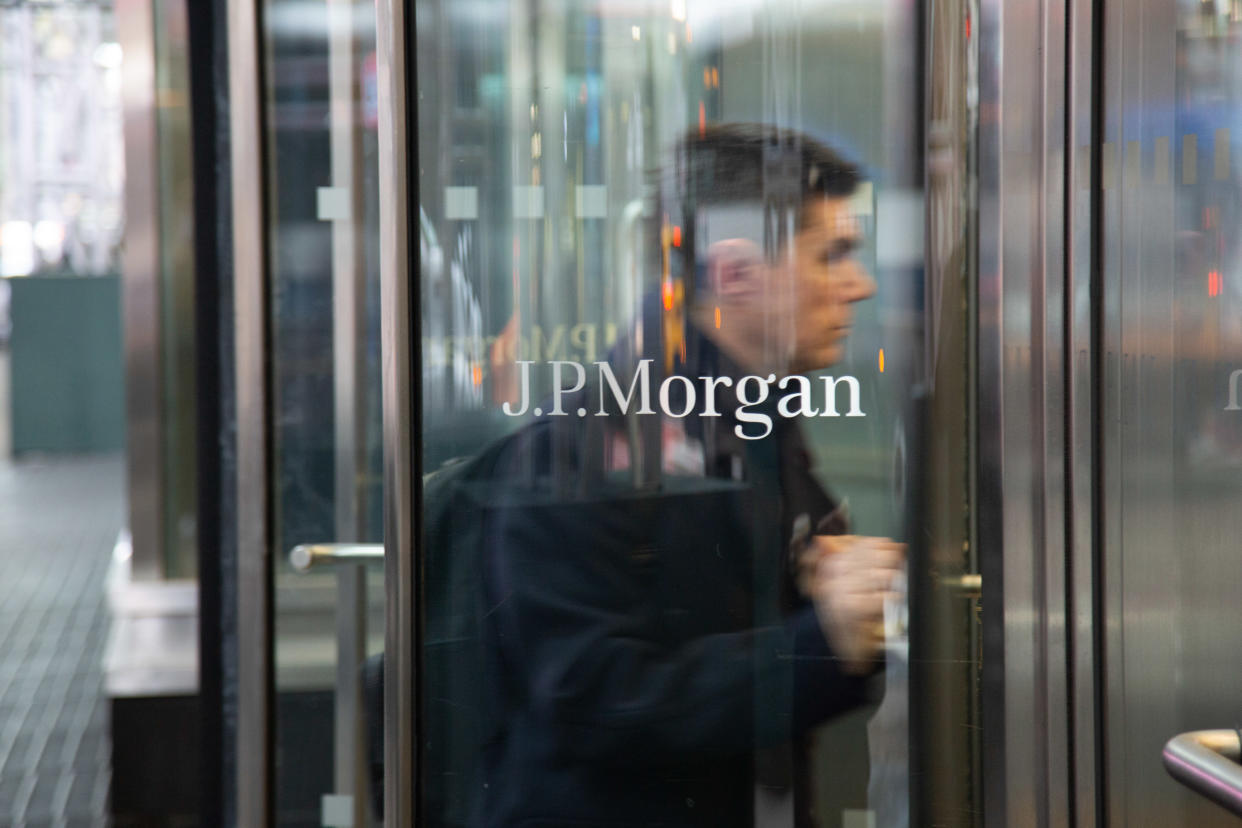 The J.P. Morgan logo sign on the entrance of a glass office building in Midtown Manhattan, New York, USA on 23 January 2020. JPMorgan Chase & Co. is an American multinational investment bank and financial services holding company has the headquarters in New York City. NY, USA (Photo by Nicolas Economou/NurPhoto via Getty Images)