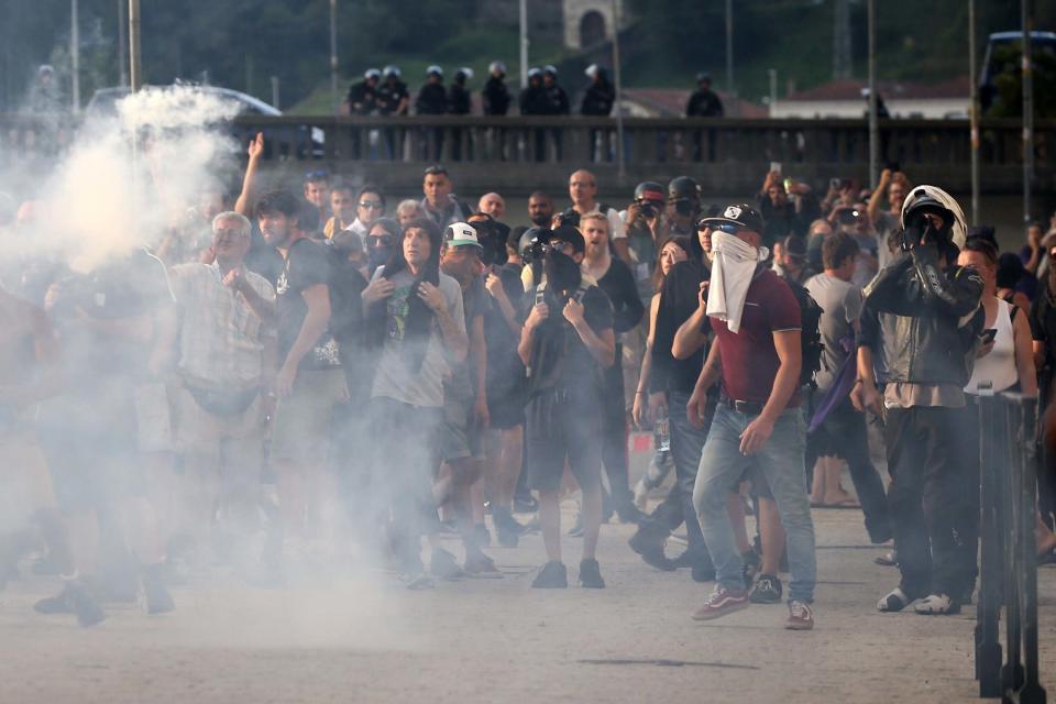 French anti-riot police clashes with protesters (EPA)