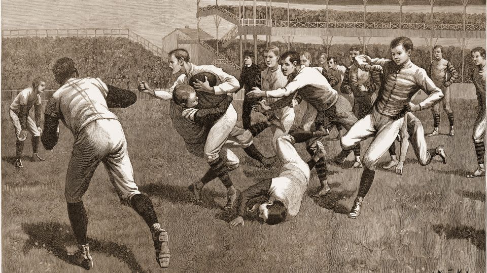 A wood engraving from "Once a Week" magazine shows the onfield action during a football match between Yale and Princeton, in the late 19th century. - Stock Montage/Archive Photos/Getty Images