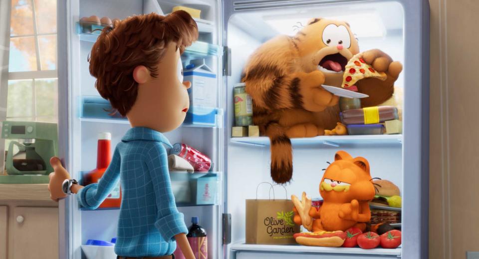 John, Garfield's dad (voiced by Samuel L. Jackson) and Garfield (voiced by Chris Pratt) in The Garfield Movie. (Sony Pictures)