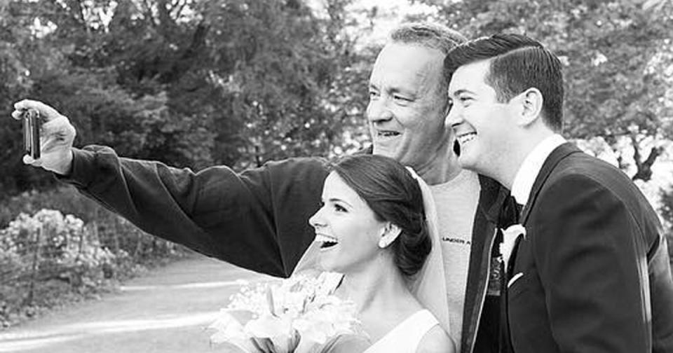 Tom Hanks totally crashed this couple’s wedding, stuck around to take selfies