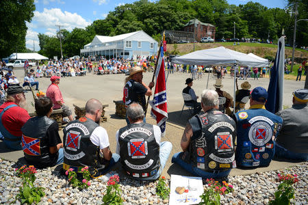 Members from The Sons of Confederate Veterans attend a dedication ceremony in Brandenburg, Kentucky, U.S. May 29, 2017 for a Civil War Confederate Soldier Memorial recently removed from the campus of the University of Louisville. REUTERS/Bryan Woolston